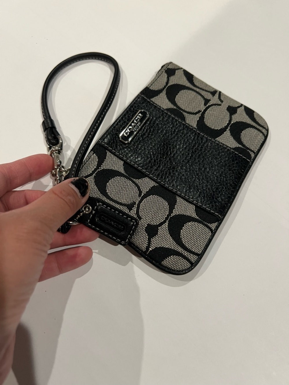 Coach Signature C canvas and pebbled leather Wristlet Pouch in Black and Gray
